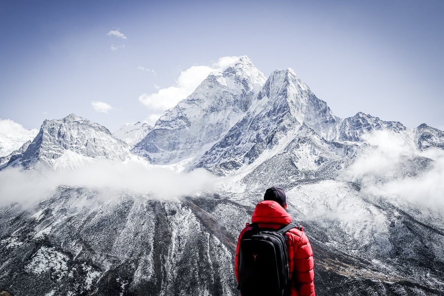 Travel guy at Ama Dablam on the Everest Base Camp Trek in Nepal