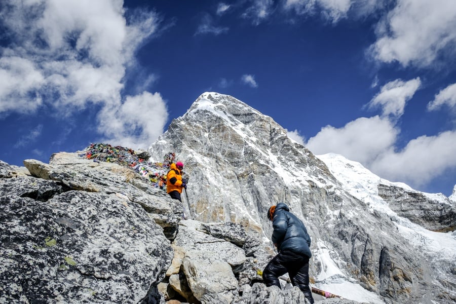 Hikers near Pumori Peak and Kala Patthar on the Everest Base Camp trek in Nepal