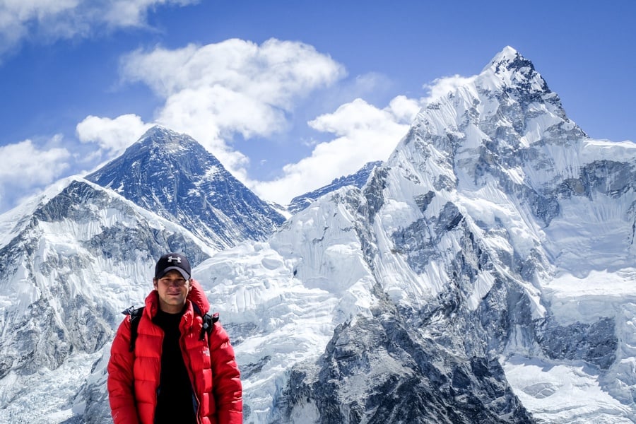 Travel guy with Mount Everest view from Kala Patthar on the Mt Everest Base Camp Trek in Nepal
