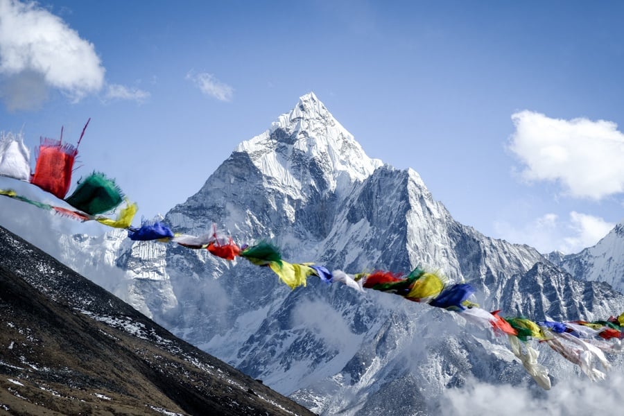Prayer flags with the Ama Dablam mountain on the EBC Trek in Nepal