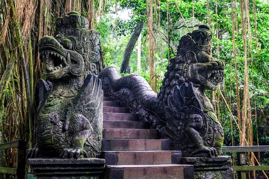 Dragon bridge and statues at the Ubud Monkey Forest in Bali