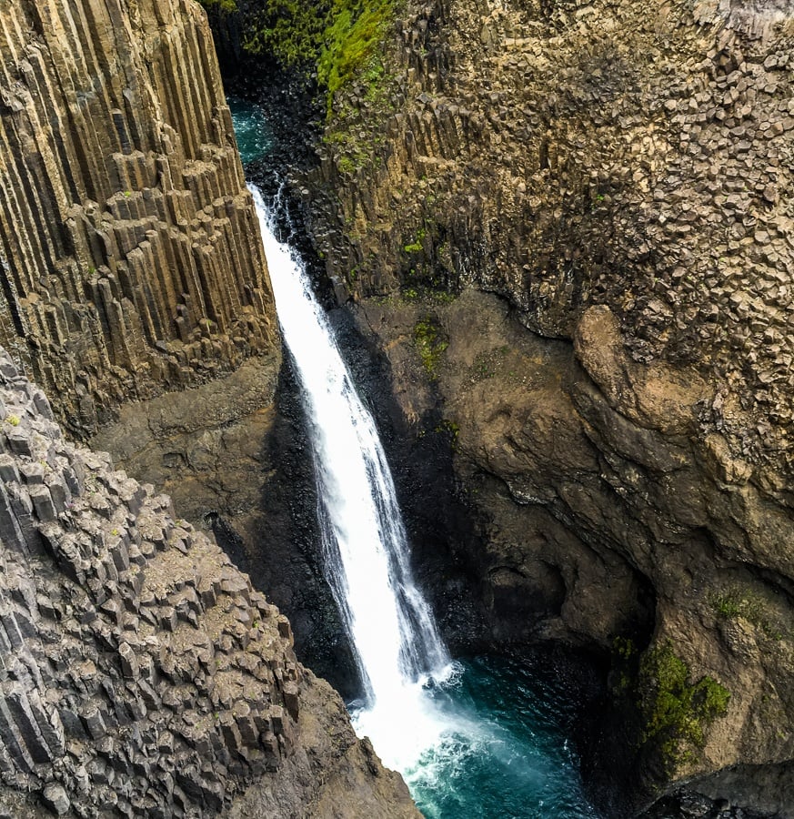 Litlanesfoss Waterfall and basalt rocks in Iceland