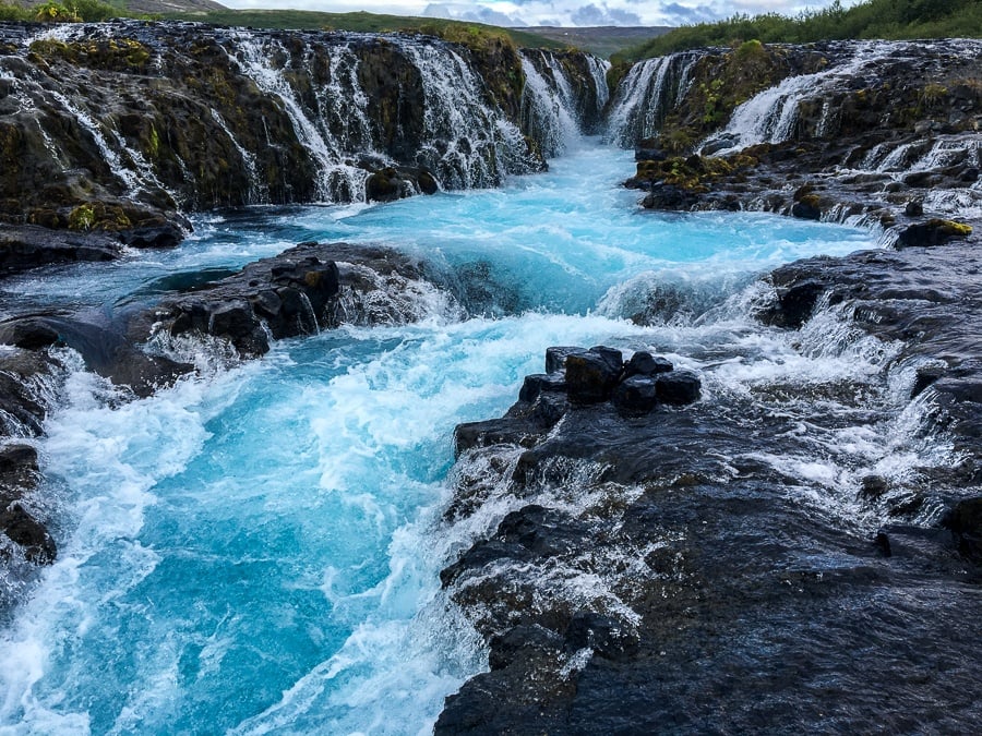 Bruarfoss Waterfall and blue stream in Iceland