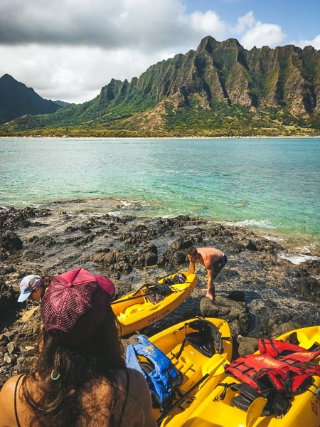 Kayakers on Chinaman's Hat Island (Mokolii) in Oahu, Hawaii